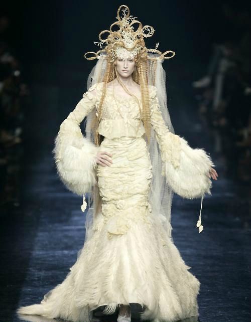 Instead, I'll just highlight two major designers who were active around this time and were notable for embodying the style.The first is Jean Paul Gaultier, who designed costumes for the previously mentioned Peter Greenaway and The City Of Lost Children: