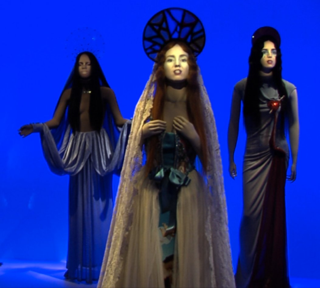 Instead, I'll just highlight two major designers who were active around this time and were notable for embodying the style.The first is Jean Paul Gaultier, who designed costumes for the previously mentioned Peter Greenaway and The City Of Lost Children: