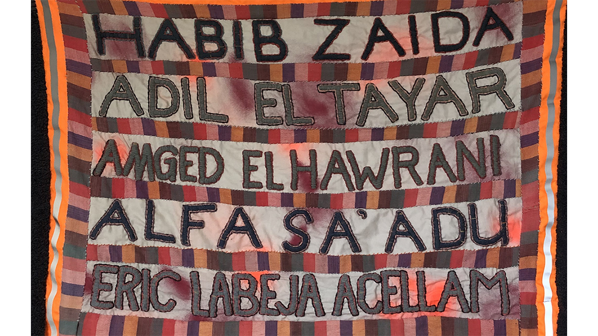 EmmaBiggsEnvir1's tweet photo. My banner, recording the names of NHS doctors who have died from Covid-19. Work in progress. Entirely hand sewn. Made from an old bedsheet, a bedspread, some of my building site PPE. #NHS #NHSheroes  #NHSThankYou https://t.co/7kZJahoKHO