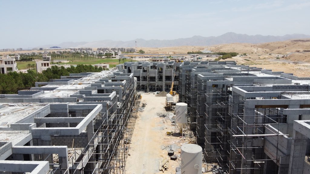 MalikDevs's tweet photo. Aerial shots of Rose Village which is now more than 50% complete and sold out! Selective units have also been plastered as shown in the first shot. Visit the Muscat Hills sales office to learn more about one of Muscat’s most prestigious  upcoming freehold neighborhoods. https://t.co/Y6Nz3hOuo3