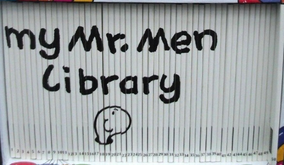 Curating my bookshelves ahead of an interview on the BBC News At One.