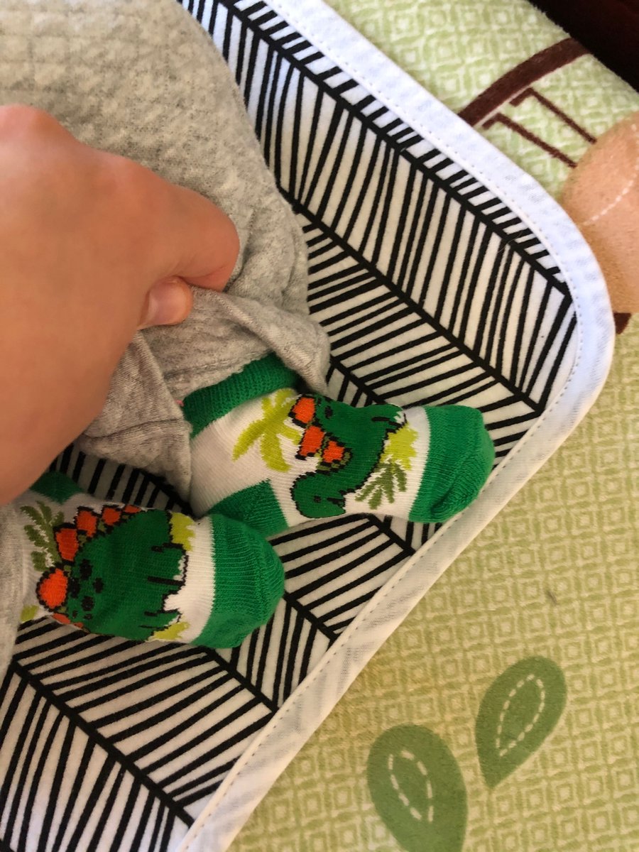 jeanasaur_'s tweet photo. You may think your son is cute, but does he have dino socks to match his dino onesie? https://t.co/hOkoSgoP4f