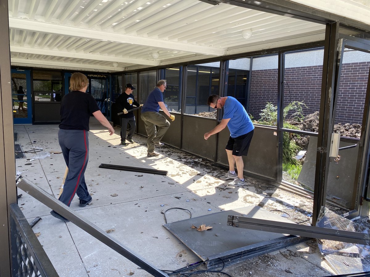 WintersetSchool's tweet photo. The Winterset Education Foundation auctioned off the opportunity to demo the vestibule at WHS.  The Purdys won and BOY did they have fun (with a little help from their friends) taking a swing at the old relic! https://t.co/qMkSr1CPBB