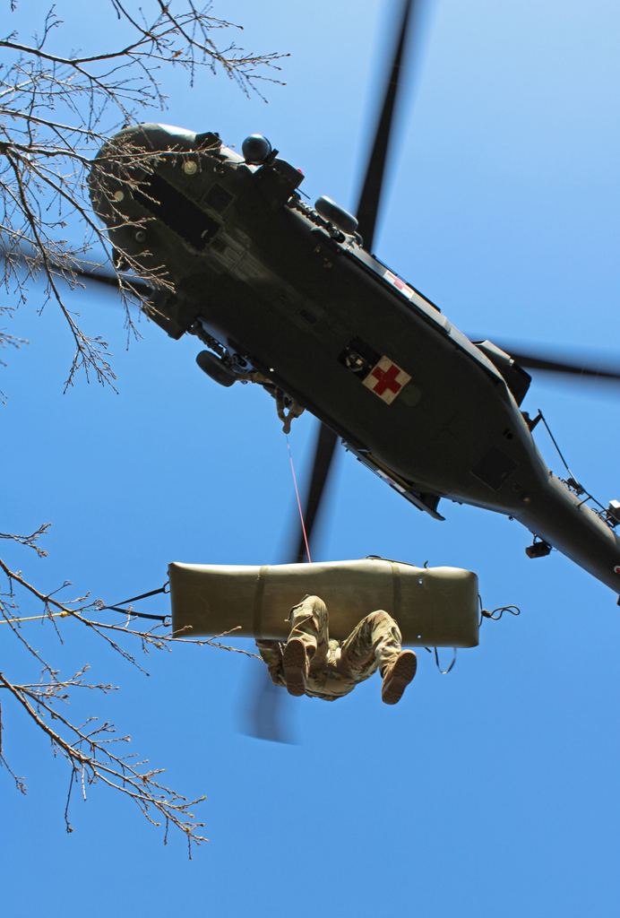 SpecWarAirmen's tweet photo. Troops doing Hoist work in Kosovo, near Camp Bondsteel. The 3rd picture I took of Camp bondsteel in the late 90s. #timeflies #kfor #campbondsteel #usarmy #usairforce #aimhigh #combatcontroller #specialwarfareairmen #10thgrp #specialforces #pararescue #medevac #dustoff https://t.co/7c6mNzmGRJ