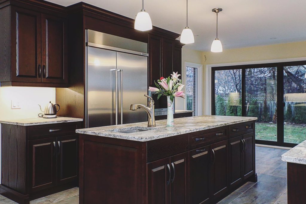 GCWKitchens's tweet photo. Dark wood cabinets are trending in 2020 but white is still holding its place in popularity.  Which do you like best? Dark stained wood or clean bright white? #kitchentrends #customcabinetry #ldnont #stthomasproud #kitchendesign #theteamtotrust https://t.co/cPZUXyJRKk