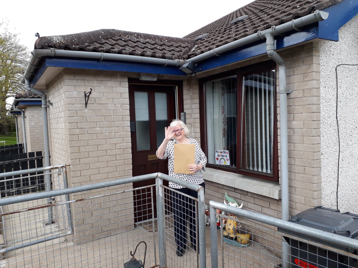 Here's Dorothy getting a visit from Linda (from a safe distance) and receiving her activity pack... Great to see her looking so well!!