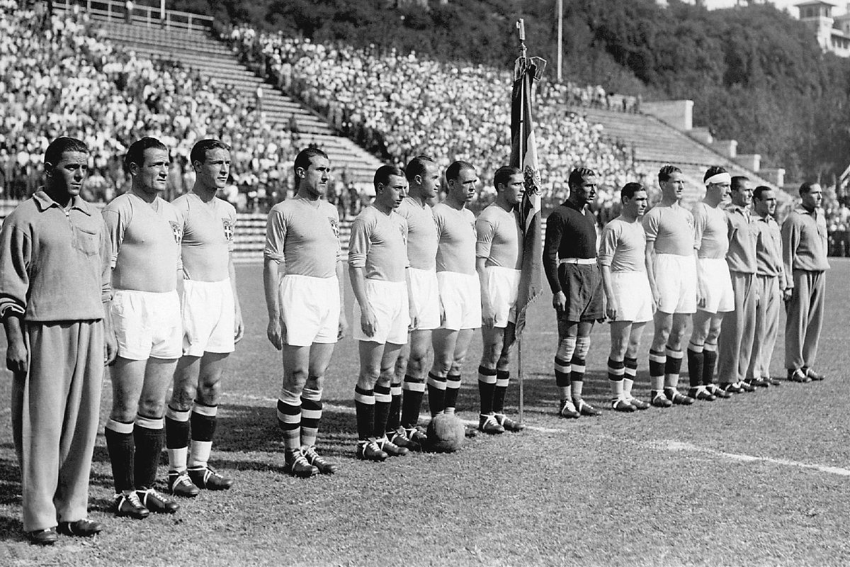 Italy became World Champion Football in it’s own country in 1934. The selection included some players who were born in South America. A term for that type of player is oriundo. Oriundi acquired Italian citizenship and Italianized their name, especially under the fascist Regime.