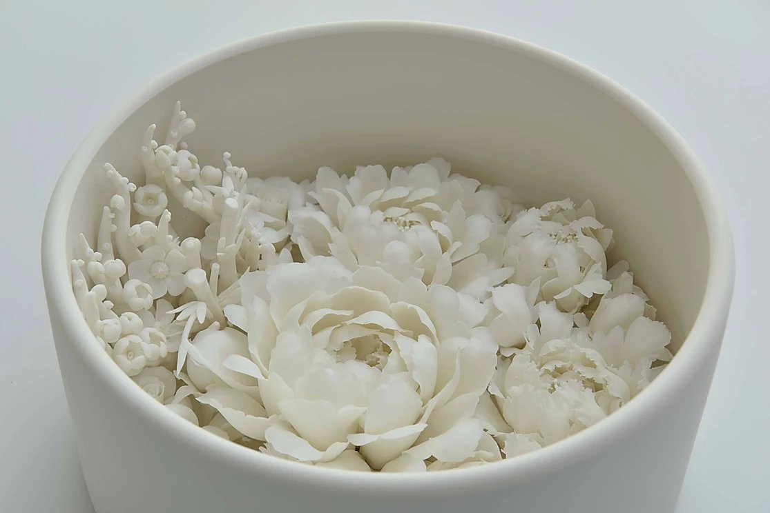 Peter Ting and Zha Cai Duan flower bowls, blanc de chine.