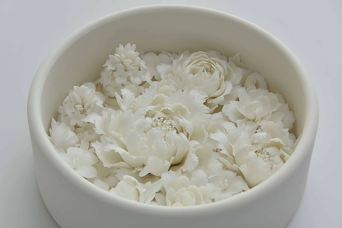 Peter Ting and Zha Cai Duan flower bowls, blanc de chine.