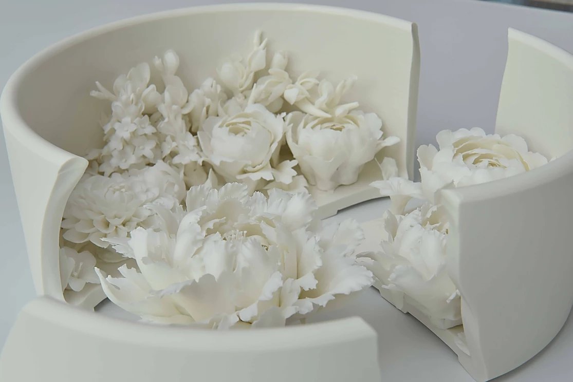 Peter Ting and Zha Cai Duan flower bowls, blanc de chine.