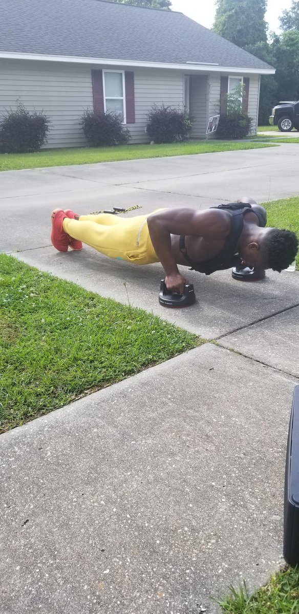 DRiceTheU's tweet photo. Duo still grinding. Social distance workout. @calebmcgill5 @treylansmith2 #basketballneverstops #weightvest #perfectpushups https://t.co/x1Osahraqm