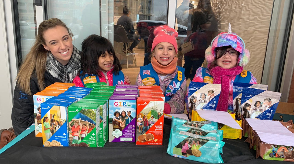 Merrimack's tweet photo. Even though Girl Scout cookie season was cut short this year, one local troop led by Julia Maggiacomo '18, found a way to share the extra treats, donating boxes to healthcare workers. Learn more: https://t.co/G6r4ZQEw4X #macksofkindness https://t.co/Z9VfXeFdWJ