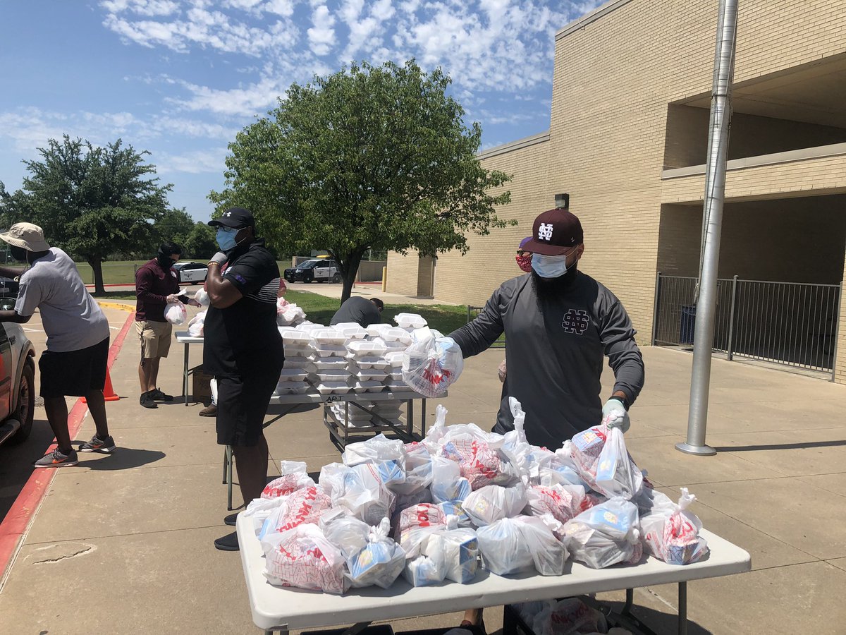 NSSteerFootball's tweet photo. The North Side, JP Elder, and Kirkpatrick Football Coaching Staffs were honored to serve the community today and pass out meals to those in need at Delores Huerta Elementary. #OneNorthSide #SteersUp🤘🏽 https://t.co/fRFbXkvpsY