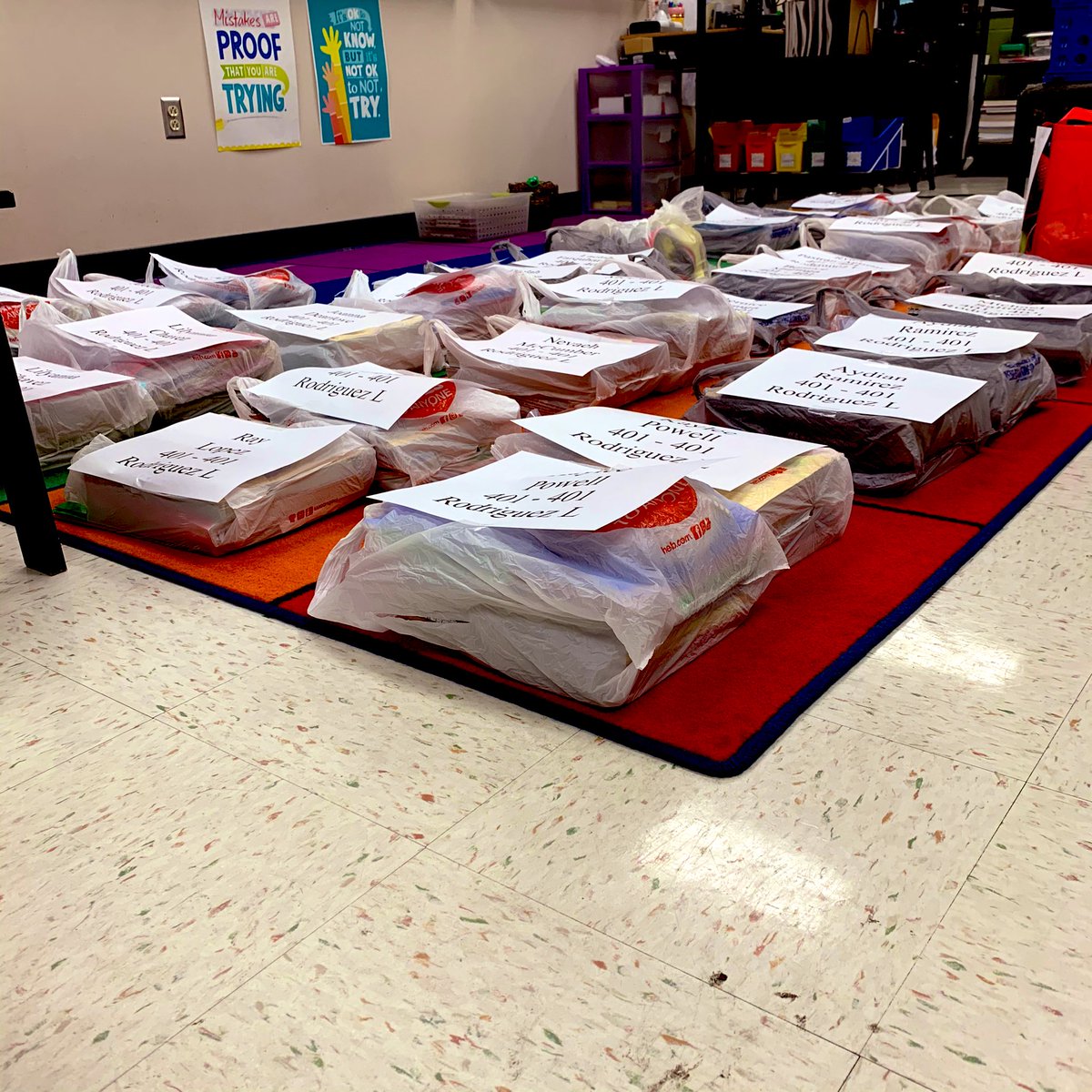 lrod0806's tweet photo. Instead of students on my carpet today I had bags with student supplies. One of the saddest days in my teaching career. #distancelearning @NISDFranklinES #kfeproud #sadteacher https://t.co/EEdtxXUqeF