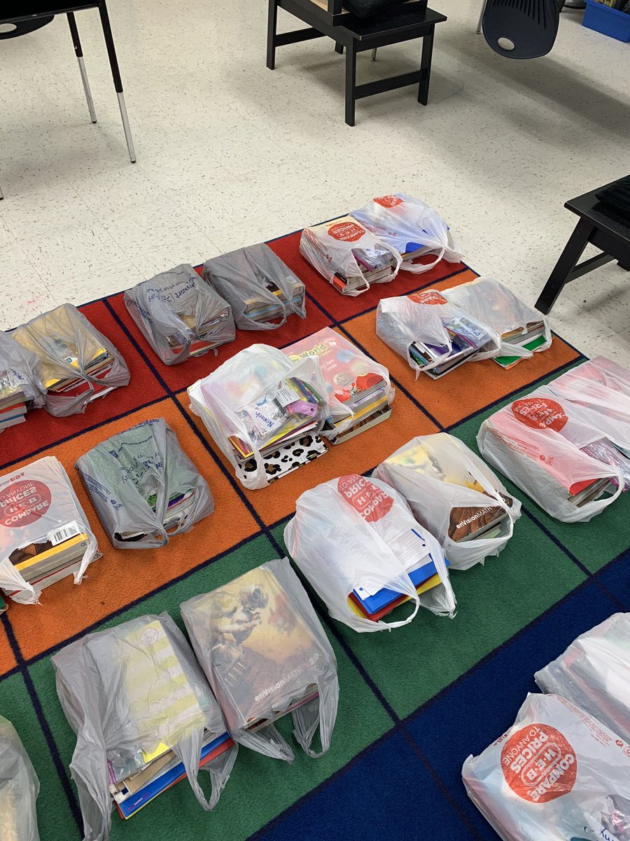 lrod0806's tweet photo. Instead of students on my carpet today I had bags with student supplies. One of the saddest days in my teaching career. #distancelearning @NISDFranklinES #kfeproud #sadteacher https://t.co/EEdtxXUqeF