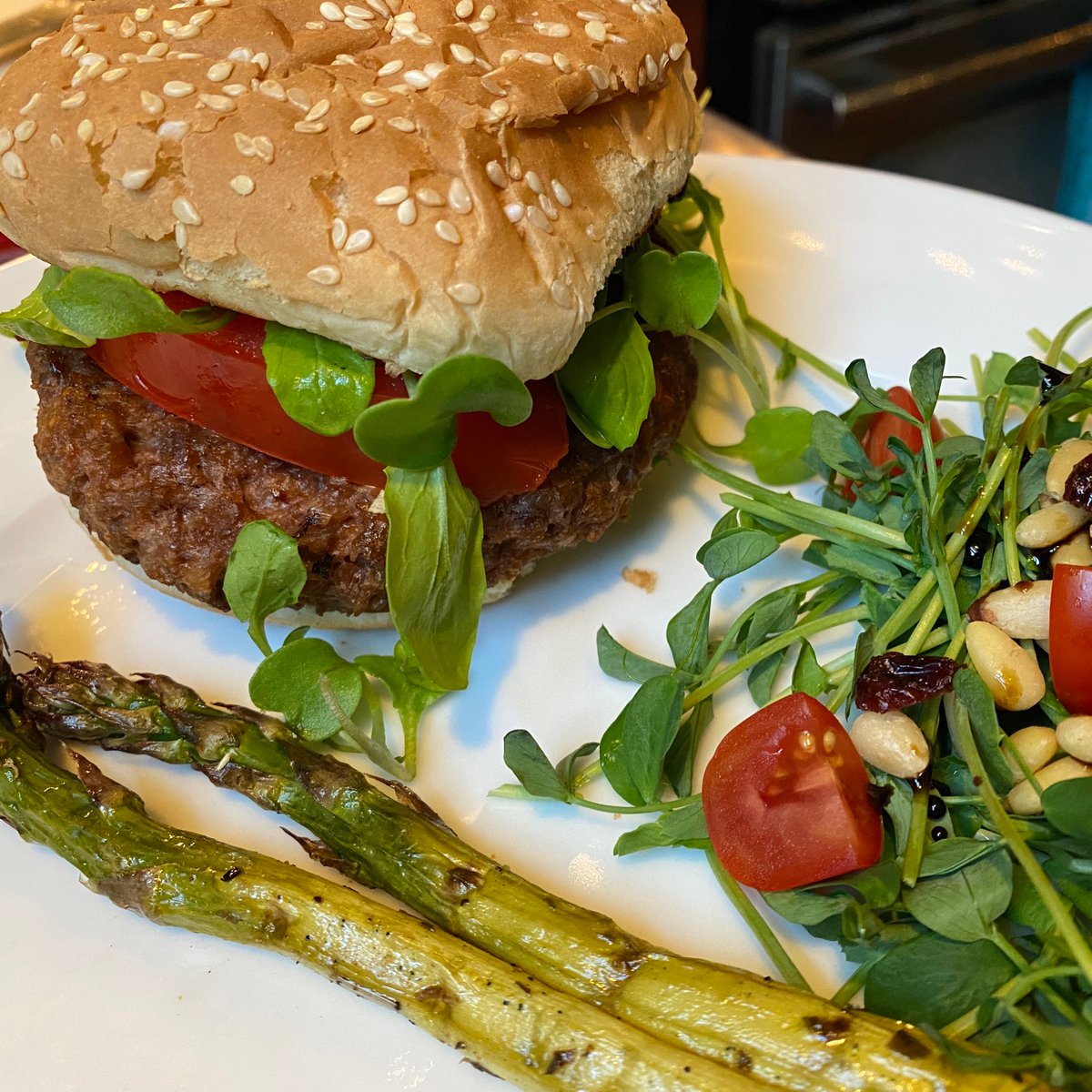 The baby pea shoots in the side salad are from East Fork Vegetables and the grilled asparagus is from Rice Family Harvest. Fresh and delicious.  #FlattenTheCurveNotTheBelly