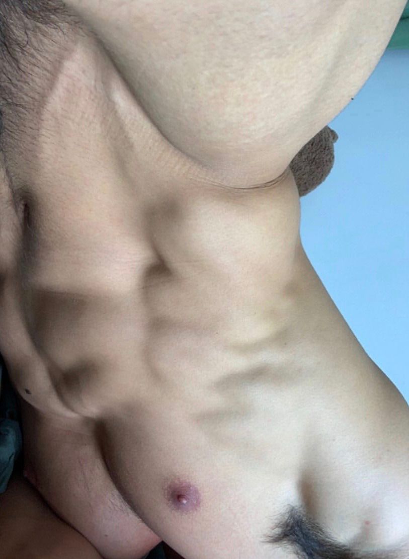 Adrian Lopez in a seductive pose