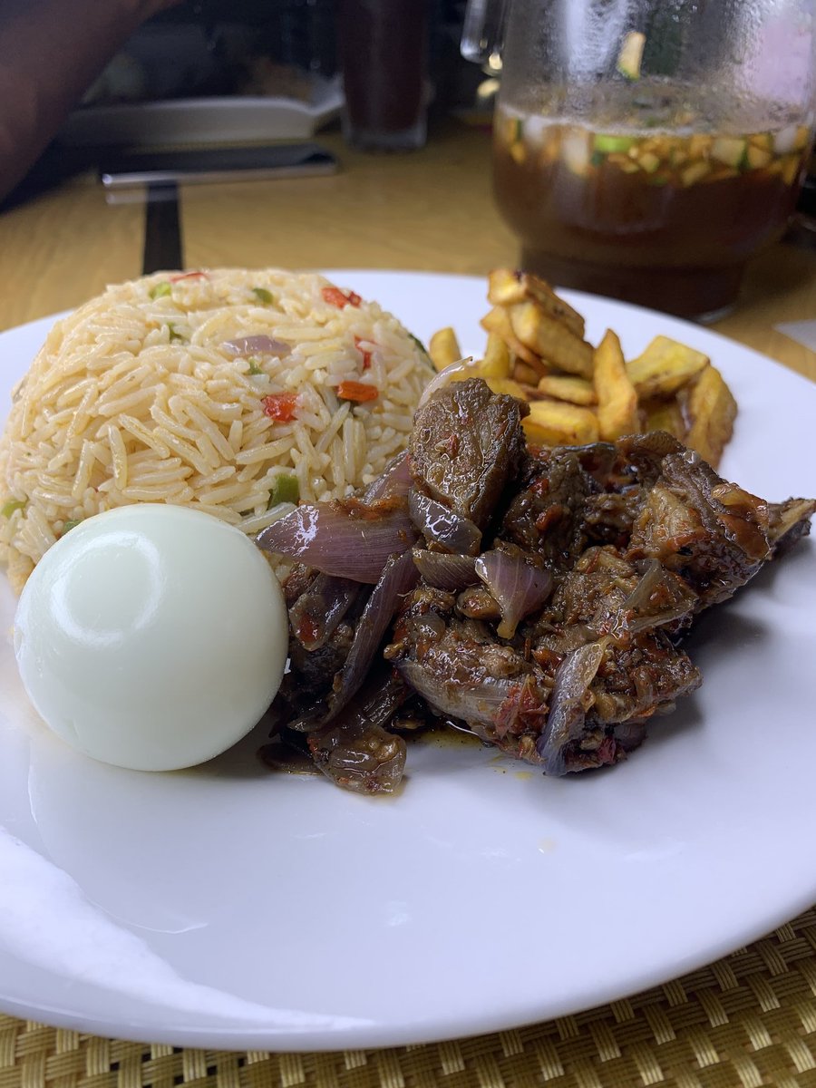 Day 9: we took a break from cooking and ordered coconut rice and Asun from  @ElsKitchen_ngHomemade: pepper soup ( I understood on this day why everyone avoided the tail of catfish on the table), plantain and egg with watermelon Drink: Iced lemon tea