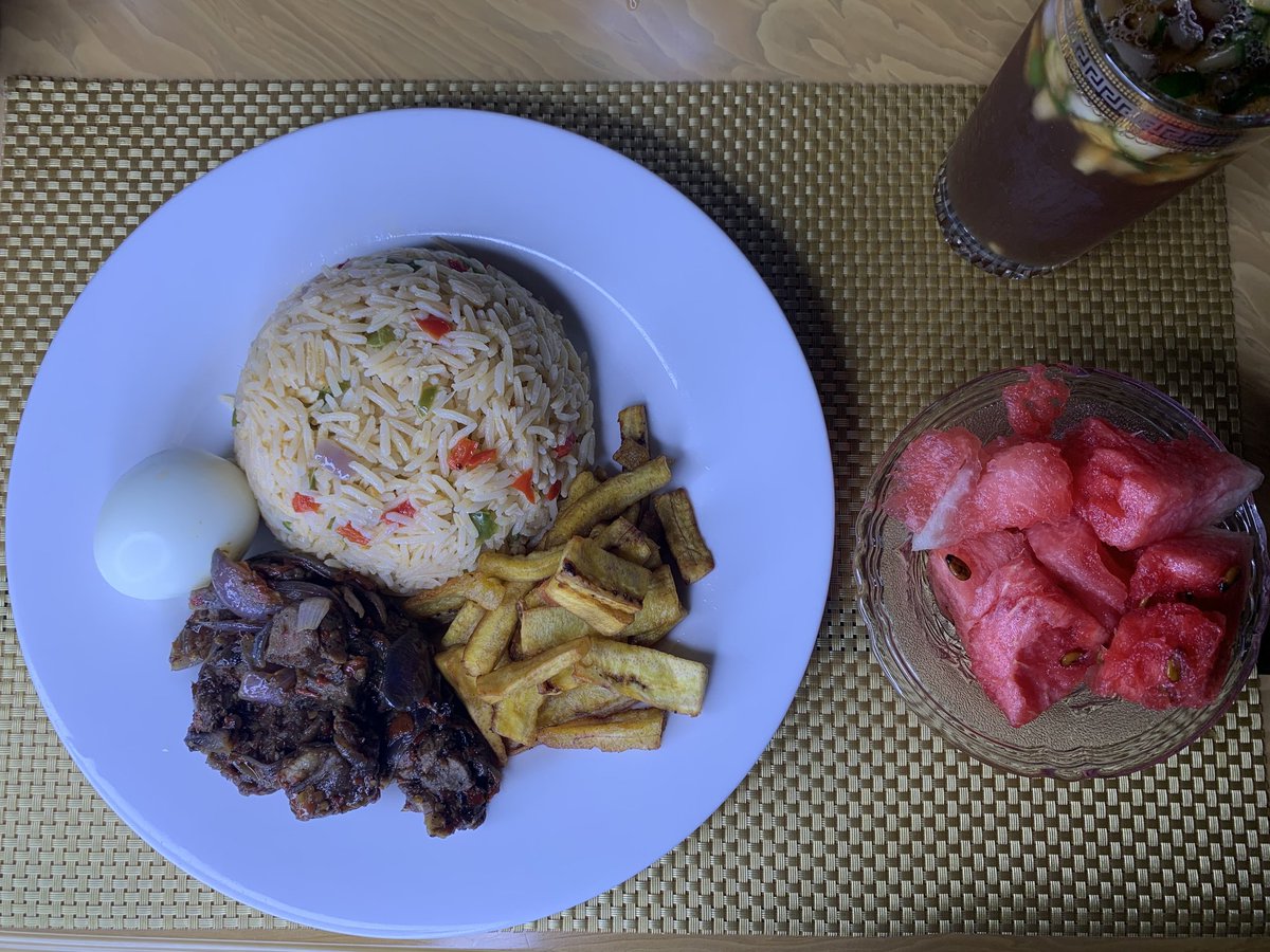 Day 9: we took a break from cooking and ordered coconut rice and Asun from  @ElsKitchen_ngHomemade: pepper soup ( I understood on this day why everyone avoided the tail of catfish on the table), plantain and egg with watermelon Drink: Iced lemon tea