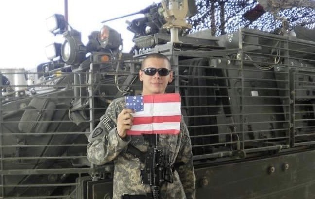 SoldiersWhisper's tweet photo. “Ten years ago today, my Son was deployed in Iraq. My neighbors kids made this Flag for him and sent it in a care package 8,000 miles from home in a War Zone. The kids were thrilled to see their flag in this picture.” - Michael Chambers #RememberThoseDeployed #Military #USA https://t.co/YjNyptyN7s
