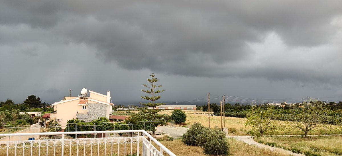 daveauld's tweet photo. Sky is blackening and the distant rumbles get louder, the wind picking up....I think rain is on the way! #Cyprus #CyprusIsCalling https://t.co/cI8RBH6FWa