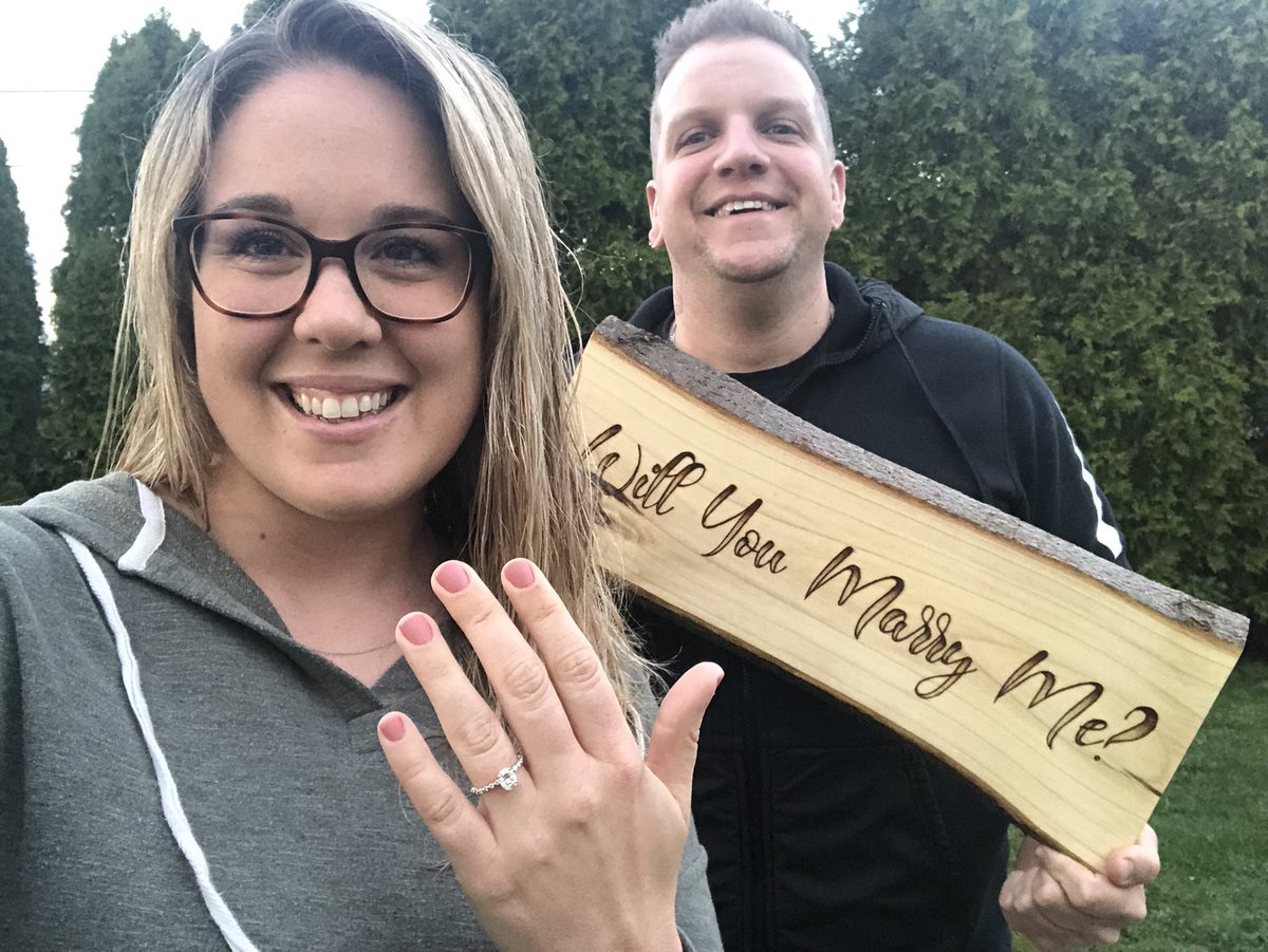 handsinthe_ER's tweet photo. @StellaArtois @Need4LSpeed #WeddingContest I'm a nurse, he's a medic. He had this sign made specially for the occasion, from a tree in the middle of a forest in Indiana. Proposed in the backyard in the middle of quarantine, with our pups, over morning coffee. 🖤 https://t.co/A0cDCkVXnj