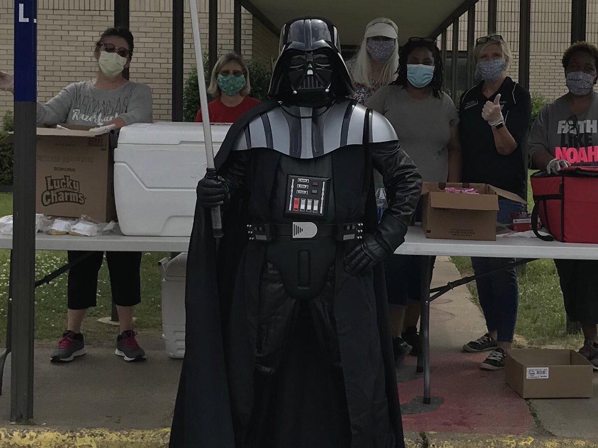 ARKRIVERESC's tweet image. Can you guess which ARESC staffer is responsible for this guest volunteer at Taylor Elem?  “May the 4th be with you” and all school folks passing out lunches and books!