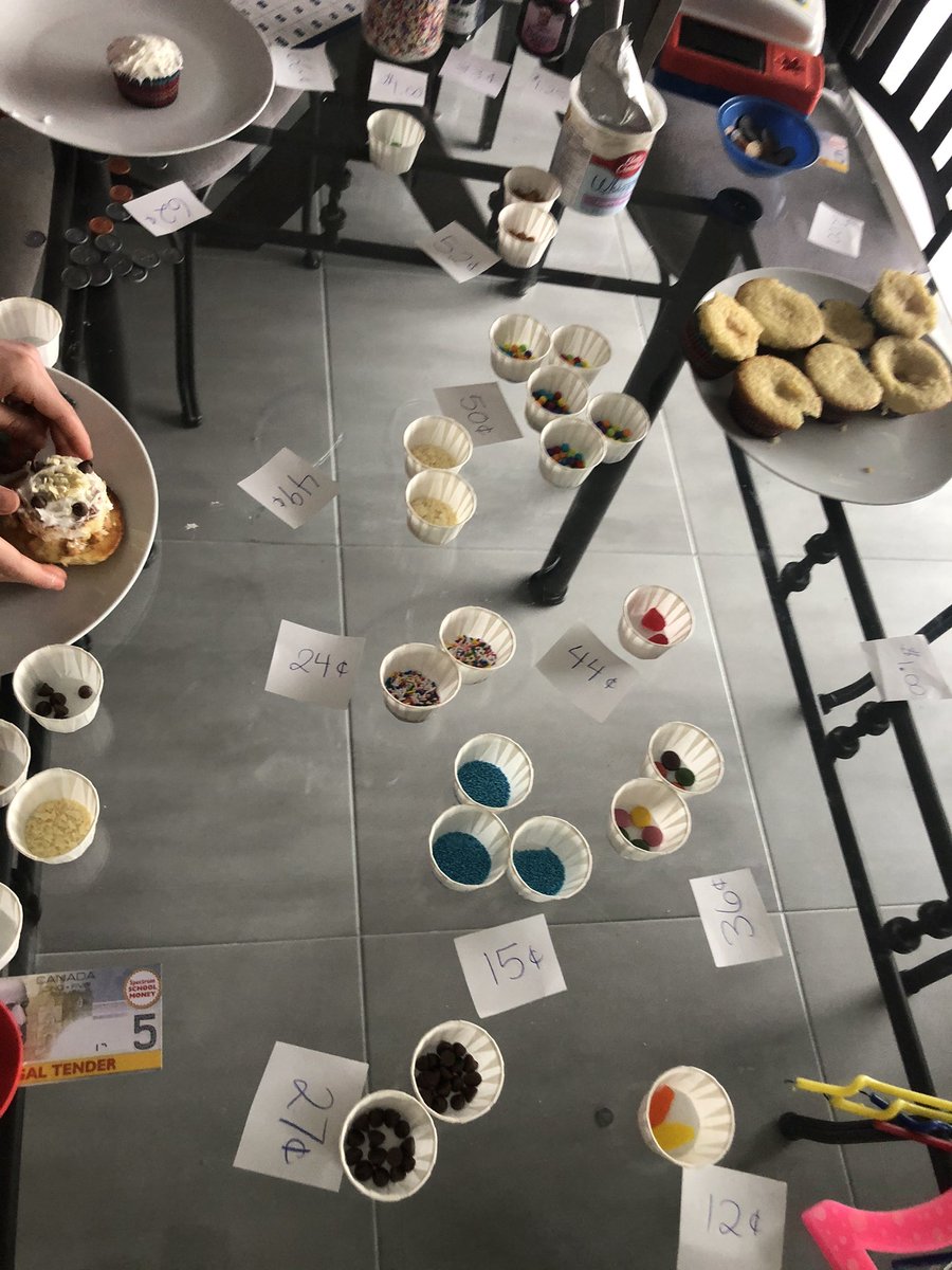 mrsgoldwasser's tweet photo. My gr 1 kid is learning about money. Is it wrong that I make her buy treats, hugs, call a friend? She’s catching on quick &amp; uses a hundreds chart as tool 2 help her. We also decorated  cupcakes (each topping had a diff price). My Gr 7 &amp; Gr 5 kids are getting in on the fun! https://t.co/W5vvMCKnPR