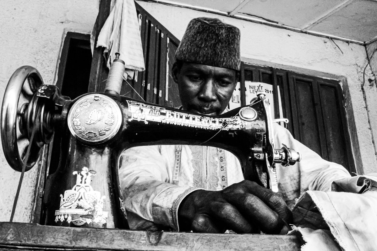 Legendslens's tweet photo. "We cannot afford to run out of business. The antecedents are unimaginable."
@CartographerNG
Said something about palliatives from the government and the tailor burst out in a laugh.

Reflections as the sun rises along the river banks.
📷 @legendslens

#legendslens #covid19 https://t.co/wU6yc4y4aO