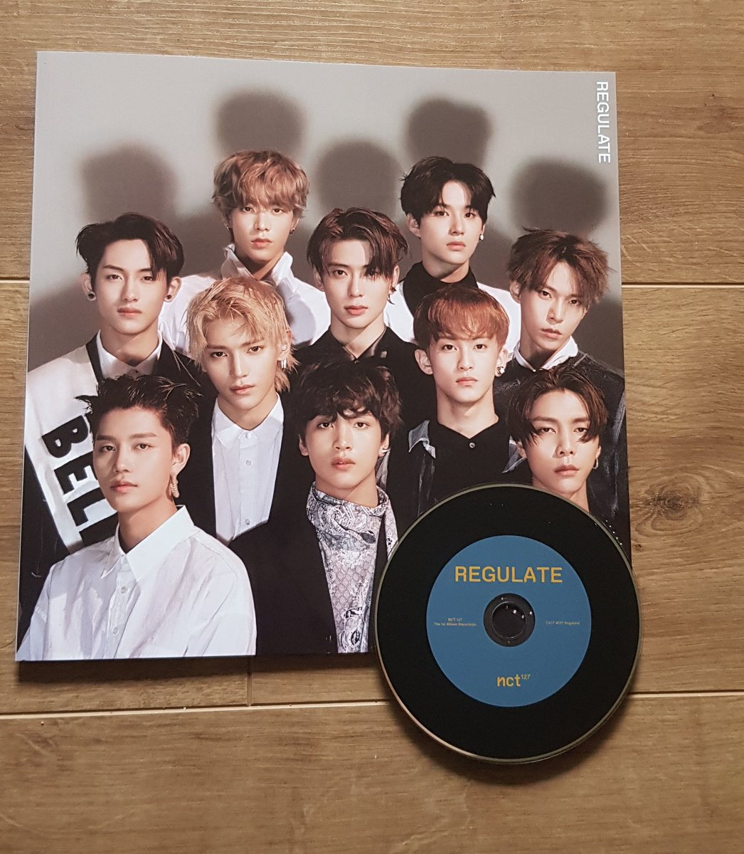 NCT 127 - regulate Version : JungwooPhotocard : MarkFavorite Song : Replay pm 1:27