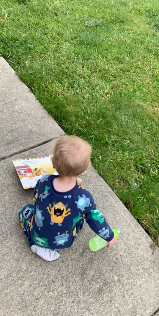 HeadTomie's tweet photo. Reading Mickey in our Jammas and as close to in the grass as we are getting for this dreary day!! @gmswarrior @gmslibrary2 @GoshenLocal https://t.co/sKD7kA43tF