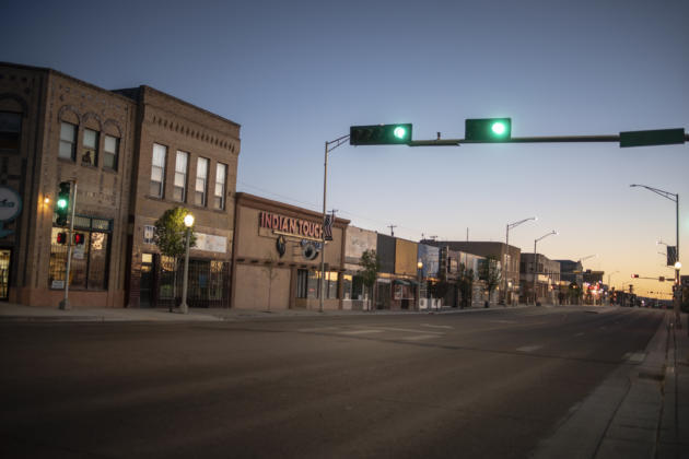EliseKapNM's tweet photo. The Gallup lockdown has been extended so @rosalesquique and I took a trip out that way to see what's up: Surreal checkpoints at all points of entry, very little traffic, families taking videos for grandmas who are locked out. Story w/ @theresa__davis  https://t.co/YGDAJVlnun https://t.co/ixB8nIeG1v