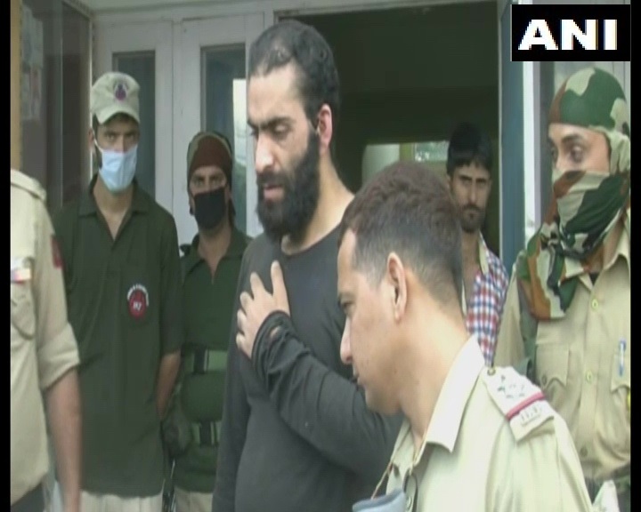 ANI's tweet photo. In a joint operation by police and Army, one over ground worker of Hizbul Mujahideen arrested; one Chinese pistol and 10 rounds recovered: SSP Doda, Jammu and Kashmir (Earlier visuals) https://t.co/2kjGsLH2Qk