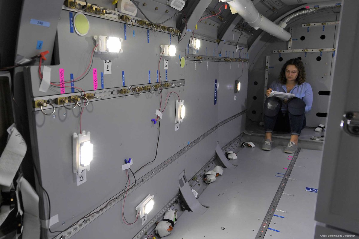 SierraNevCorp's tweet photo. Carson here! I’m taking measurements of the illumination produced by the internal lights using a light meter to facilitate communication between SNC &amp; @NASA. This area is considered a workstation &amp; must be lit well enough so a crew member can read, write &amp; perform science. https://t.co/6URqQCcjC6
