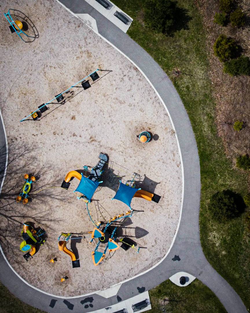 SimulacraSims's tweet photo. The parks are all empty. Kind of creepy and beautiful at the same time.

#aerialphotography #quarantine #socialdistancing #park #playground #springtime #birdseyeview #perspective #simulacrasimulations https://t.co/WYzvzSbEGY