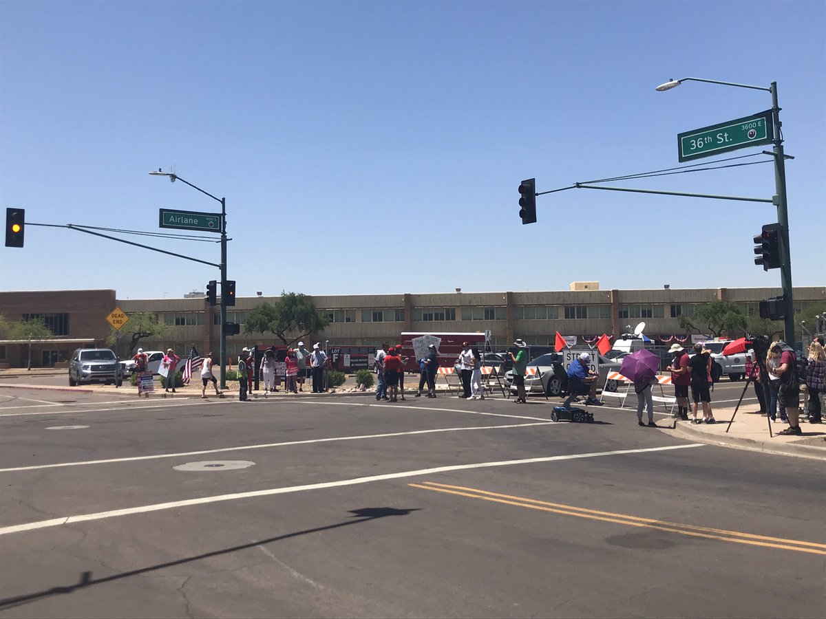 It’s 12:19 pm. I’ve heard Air Force One has landed.Dozens of folks in  #MAGA gear and other apparel in support of the Pres.  @realDonaldTrump are lined up in the hopes of seeing the president as he enters  @Honeywell_Aero.  @azcentral