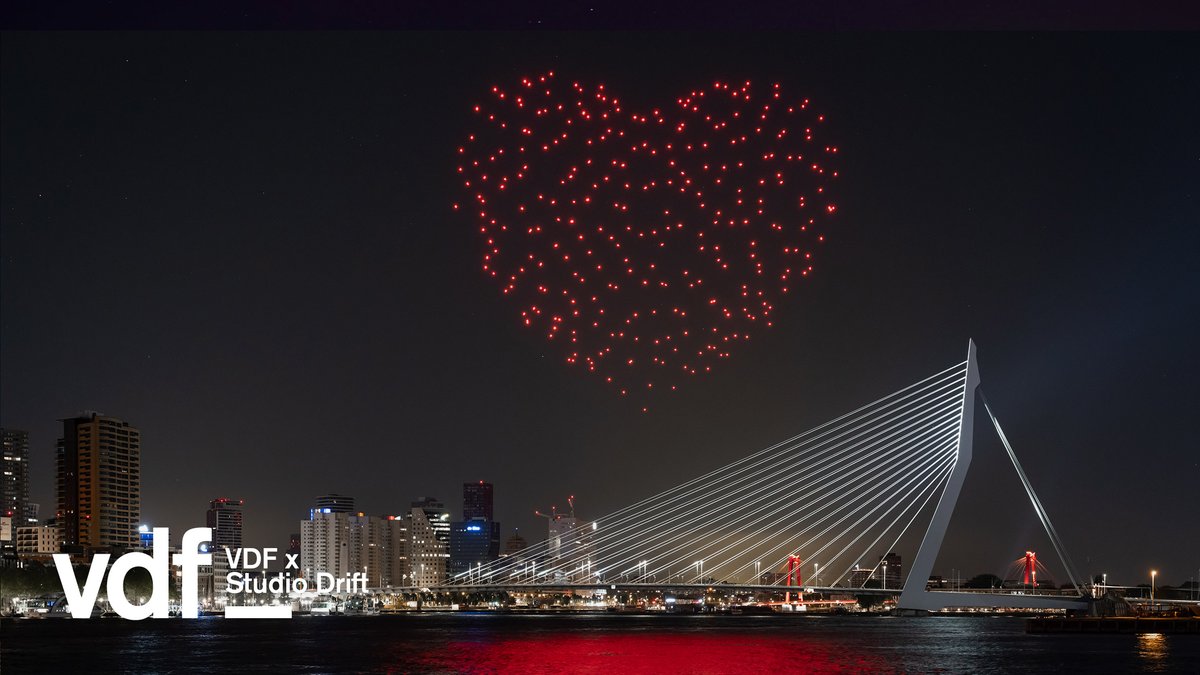 dezeen's tweet photo. @StudioDrift created a red beating heart above Rotterdam tonight as part of a special drone performance in tribute to healthcare workers. Our live stream has ended, but you can still watch the full performance at Virtual Design Festival: https://t.co/nlZqnrMQD8 https://t.co/O1ZF62K7i6