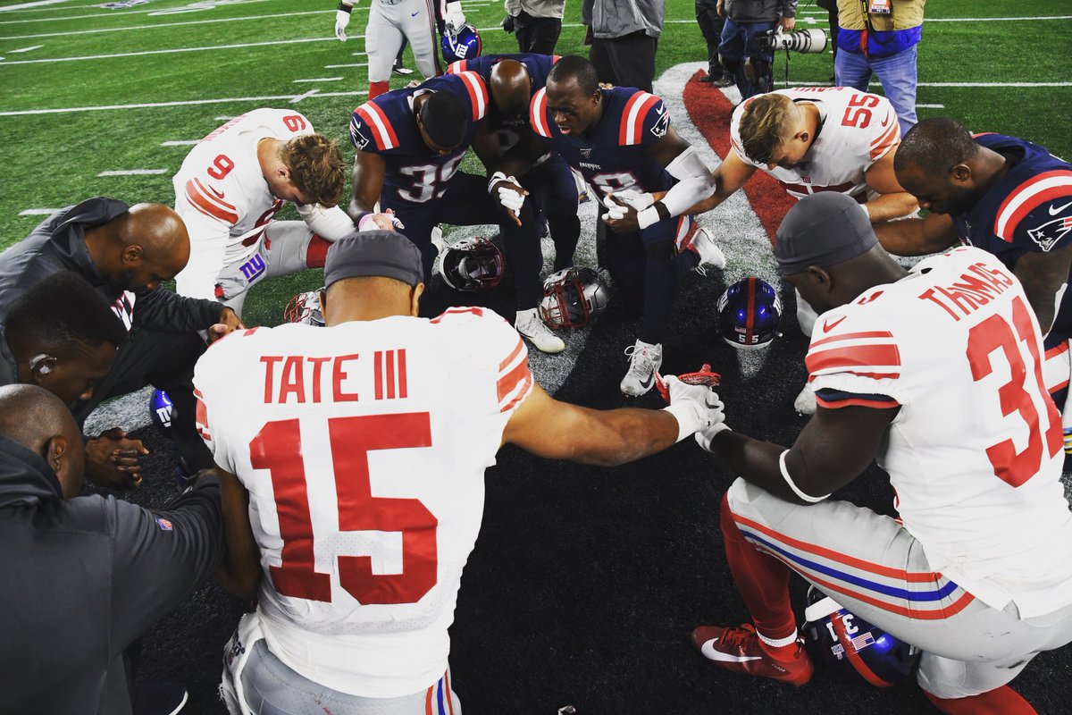 ShowtimeTate's tweet photo. Bigger than the game. 🙏🏽 #BrothersKeeper #PostGamePrayer @NFL https://t.co/lglOGmEzFJ