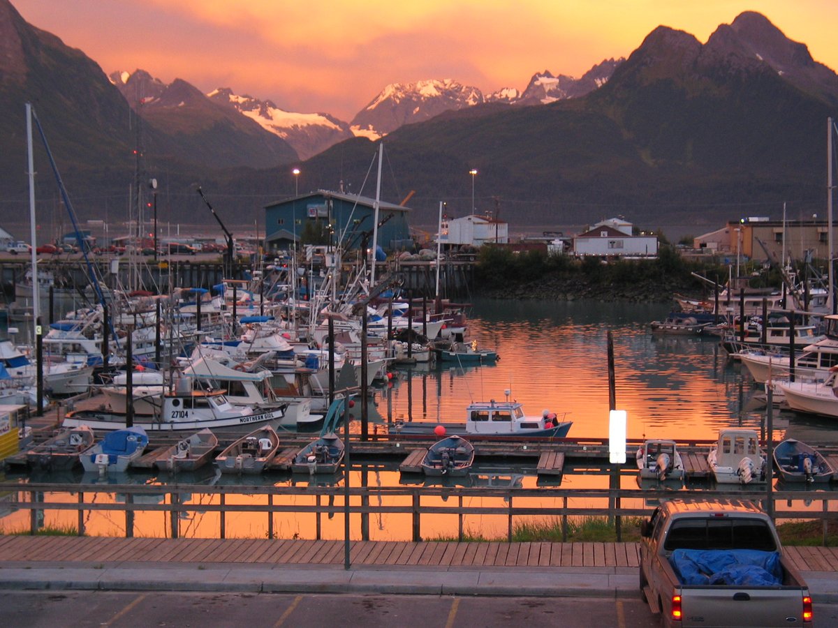 The Chugach Mountains surround Valdez, AK in 360 degrees.  The glow on the snow-capped peaks accent our sunsets anytime of year.  Valdez is an essential stop on a RoadTrip adventure in Alaska. (PC: Anadyr Adventures) #stanstephenscruises #virtualRoadTrip #nttw2020 #spiritoftravel
