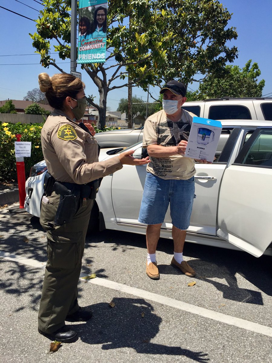 NorwalkLASD's tweet photo. NET deps Gentille and Gutierrez gave water purifiers to the Norwalk Senior Center, right in time for this heat wave. Thank you to the Chinese Chamber of Commerce of Los Angeles and US-China Guangdong Chamber of Commerce for donating these items to be handed out! #LASD #Norwalk https://t.co/u2wjShPPXA