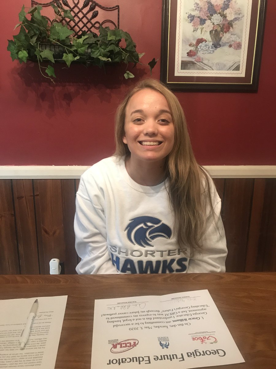 AlisonB2015's tweet photo. GFE Signing Day: So excited for Gracie Williams who will be attending Shorter University! Thank you Dr. King for your participation in our Signing Day! So proud of you, Gracie! 
@FloydCCA @DrTeachinHawk @TeachingHawks 
@shorteruniv #gaeducatorsigningday20 #gafutureeducator https://t.co/X2SyNXXKzl