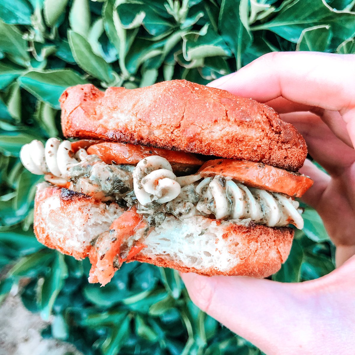 gfsocialite's tweet photo. Little bite, lots of taste 👅. I combined one of my remaining  @canyonglutenfree hamburger buns with the super pesto sausage fusilli meal from @getfreshly to create this beaut.
Matt said “crazy times call for crazy sandwich”, I call it “I want carbs”. 
https://t.co/XwqfxR2Zie https://t.co/cmJ75TxrgF