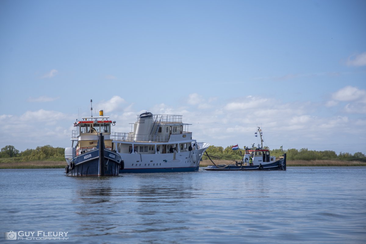 Dutchyachting's tweet photo. The #classic #Feadship #Istros left the shed after an extensive refit and headed to #Harlingen to be put in the water last Monday. The 42.06m/ 137’1” yacht returned to #Makkum to enter Feadship’s shed and to join the repainted W yesterday. Photos by GuyFleury Photography https://t.co/eEshJzIRdn