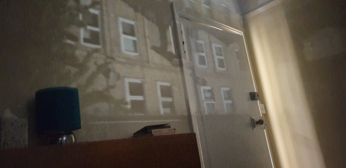 The way our curtains fell made a pin hole camera. We woke up to find the houses across the road projected onto our bedroom wall!