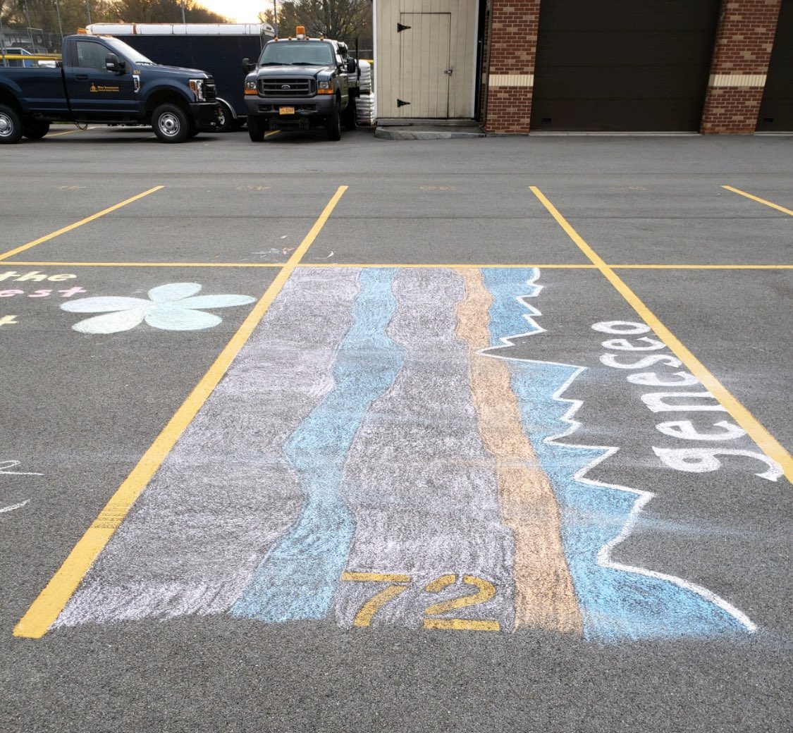WestIrondequoit's tweet photo. Some artwork at IHS. 

We 💙💛 this. 

Our students showing their creativity and resilience with a piece of chalk. 

👍🎓👏 https://t.co/a6fkNmBlVA
