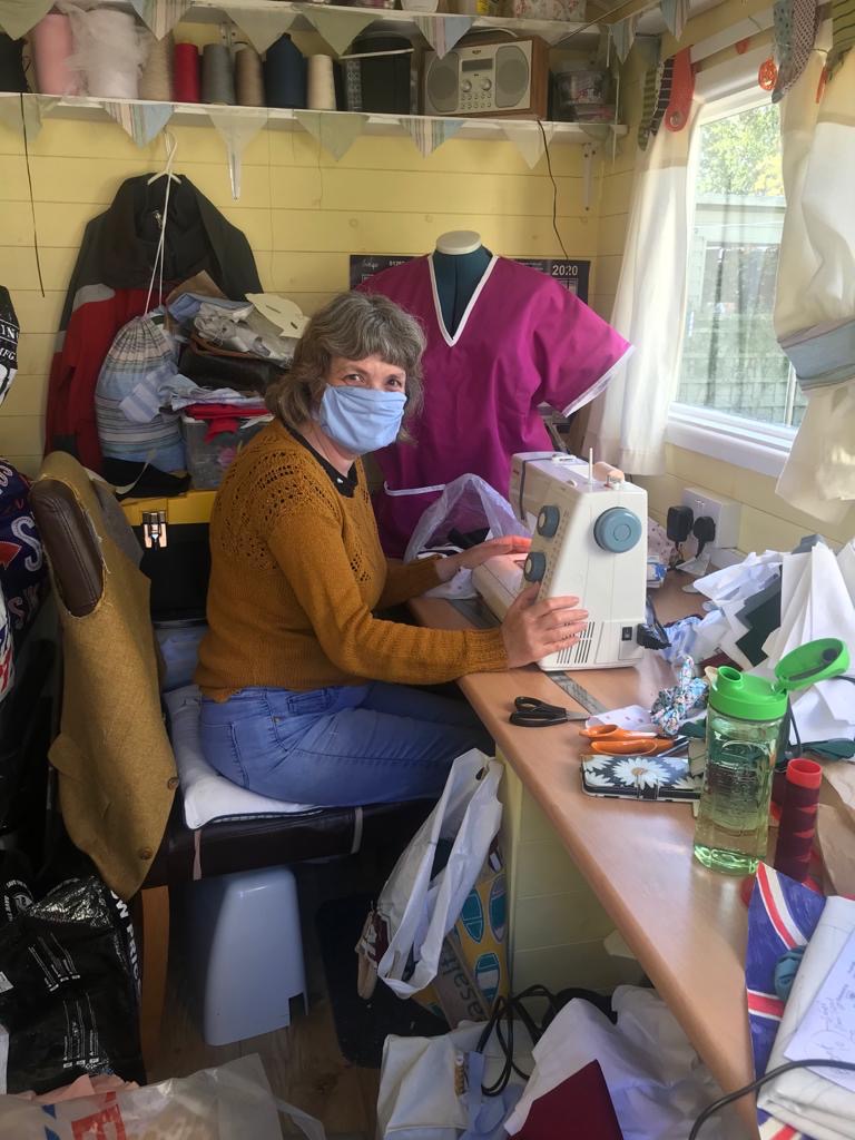 QCHospice's tweet photo. Here are our Churchtown Shop #Volunteers raising money for Queenscourt retail. We have our lovely Sandra creating rainbows, Dotty making her famous cakes, Ian growing &amp; donating plants &amp; Louise, who is not only making masks but sewing up scrubs too. 💜💚 #compassionatecommunities https://t.co/h7BT1AESUW