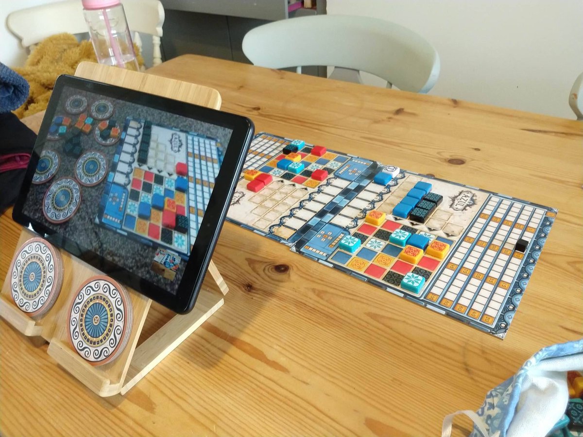 Myself and friends played Azul (Plan B Games, and designer Michael Kiesling) via Facebook Messenger video call! I placed out the tiles and (re)moved them according to their wishes, and replenished the bag accordingly when rows filled up… It sort-of worked! #gamenight #bgg