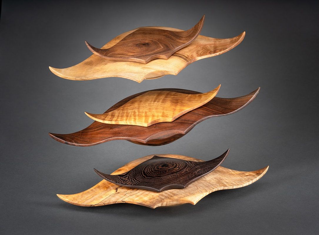 mikewoodturner's tweet photo. From Top to bottom 1) Sugar Maple &amp; Walnut Manta Ray Box 2) Black Walnut &amp; Curly Movingui Manta Ray Box 3) Sugar Maple &amp; Wenge Manta Ray Box
::
#MantaRay #Woodboxes are sculptural art with a utilitarian function.  
#woodturning #woodworking #wood #handmade #sculpture #woodturner https://t.co/1GkSjKhSBN