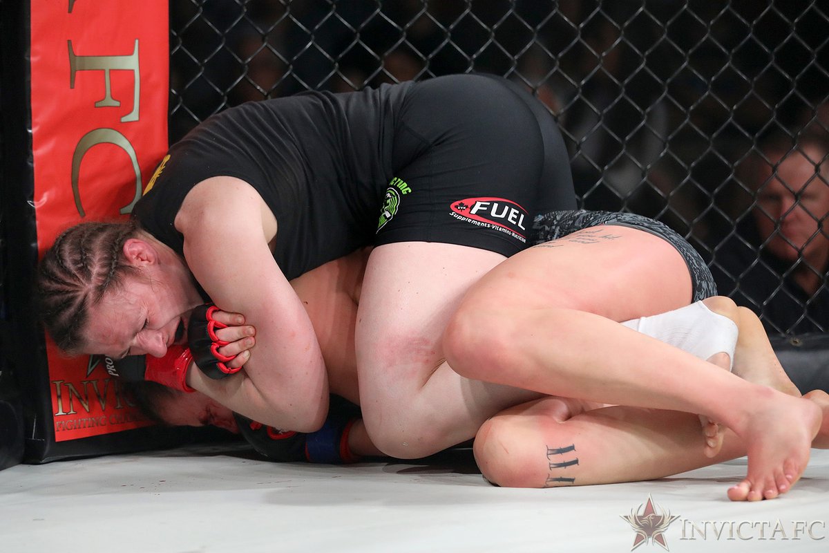 InvictaFights's tweet photo. Veteran @mmasarah secured the first submission victory of her storied career, choking Germany’s Katharina Lehner in the third round to claim the bantamweight title at #InvictaFC29! https://t.co/KZB28Tdyem