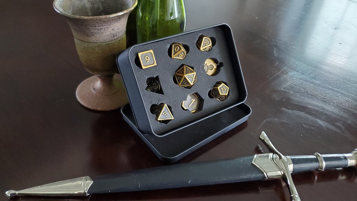 FlashFantasy's tweet photo. Grab an ale and kick back at your favorite tavern with this brand new, all metal set of Kraken Dice! To enter and be eligible to win:

🎲 Like 👍
🎲 Retweet 🐦
🎲 Be following @FF_Cast

Winner announced 5/18 during the season premiere of our D&amp;D show, Rift Walkers! #dnd #giveaway https://t.co/kx7rF5Hj5o